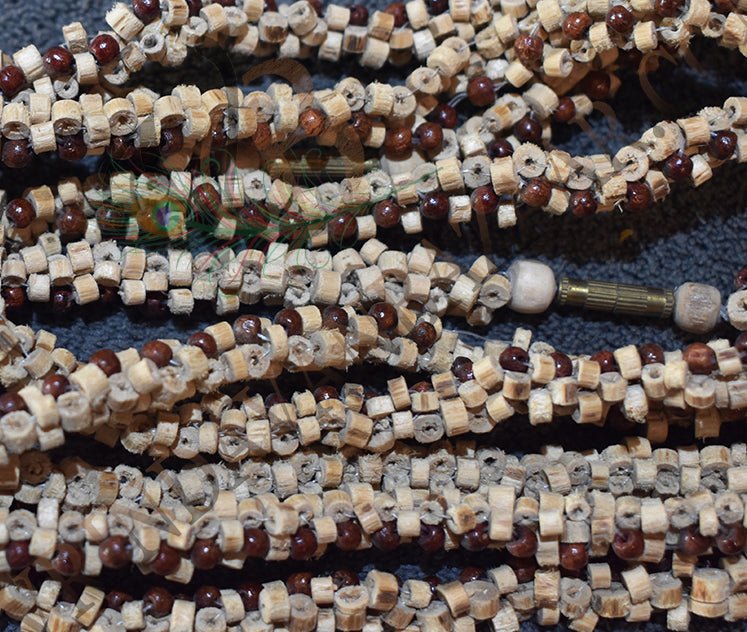 Interlacing tulsi with red sandalwood beads kanthi mala