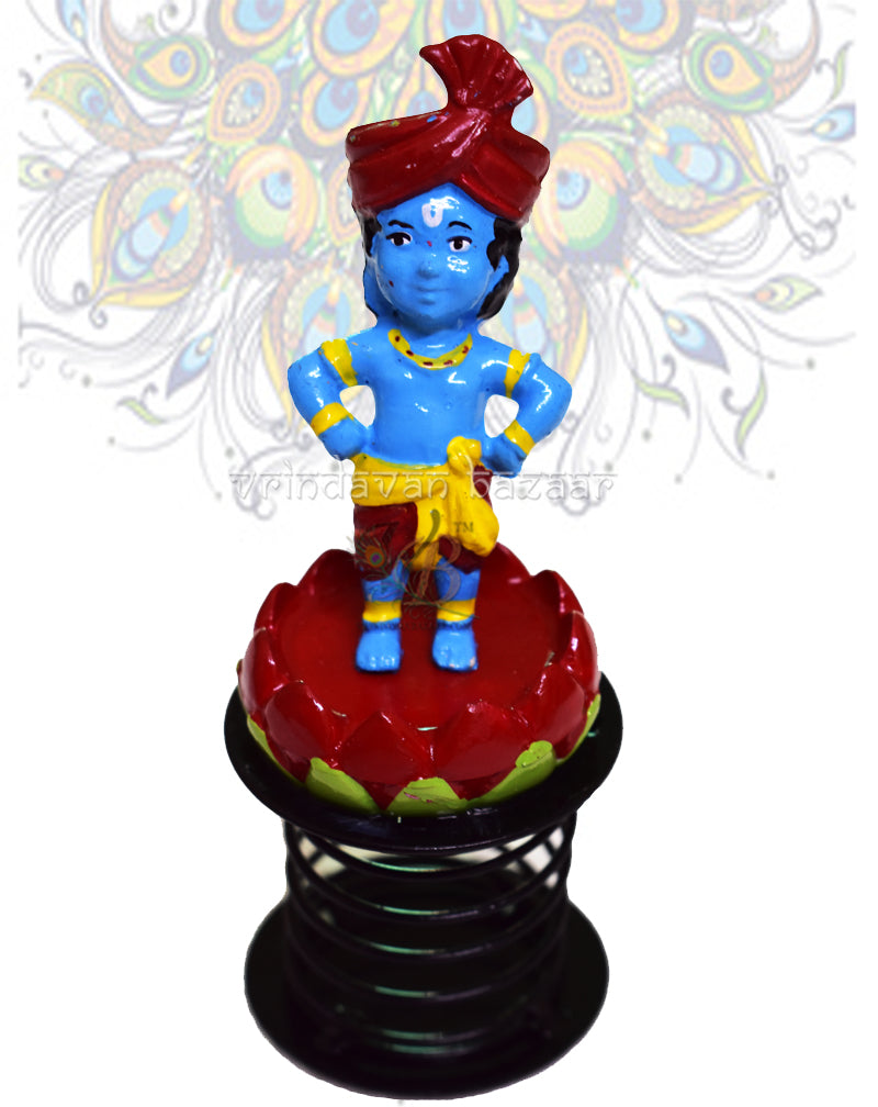 Cute blue krishna wearing turban on lotus base fun spring