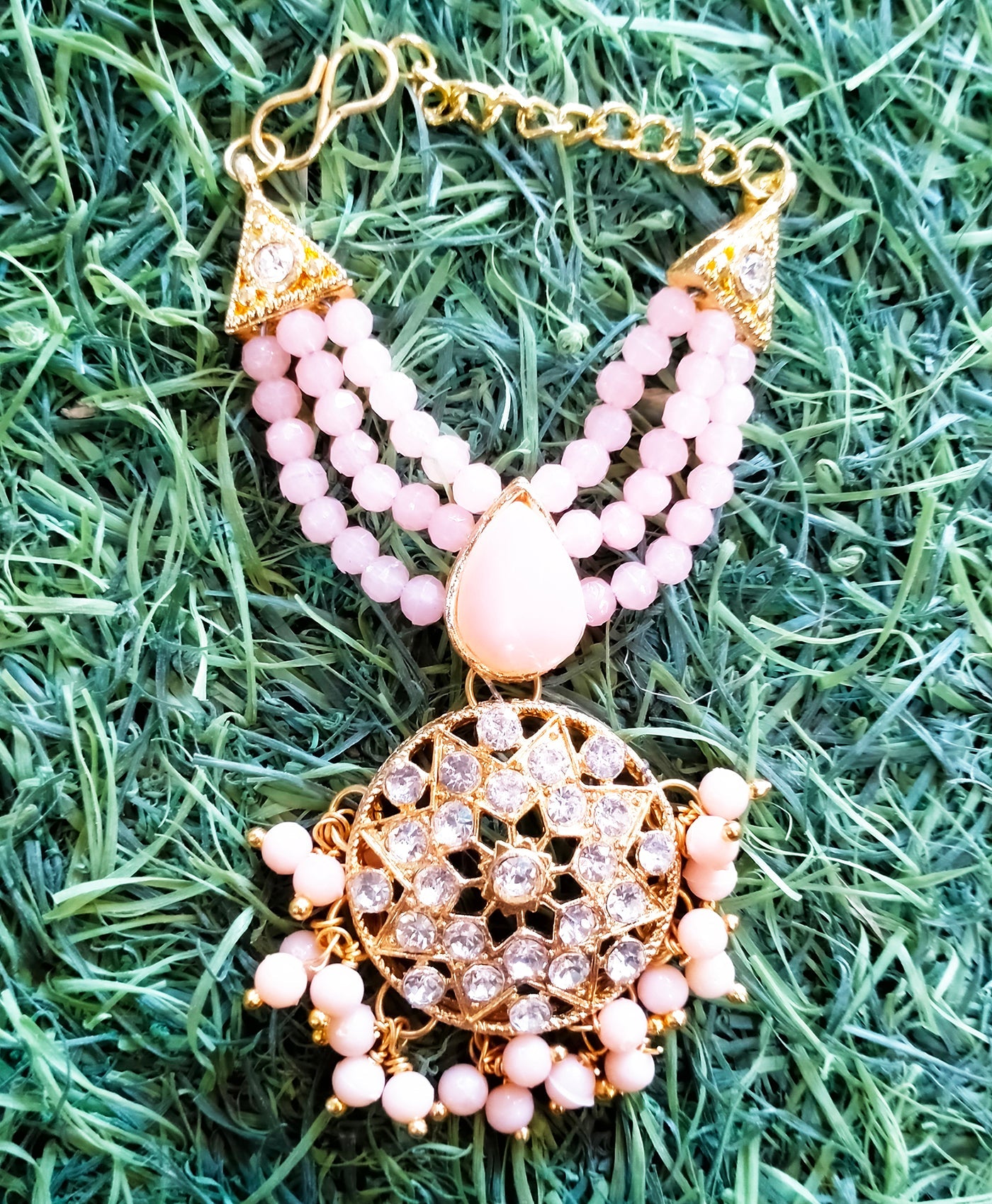 Drop bead with round stone pendent