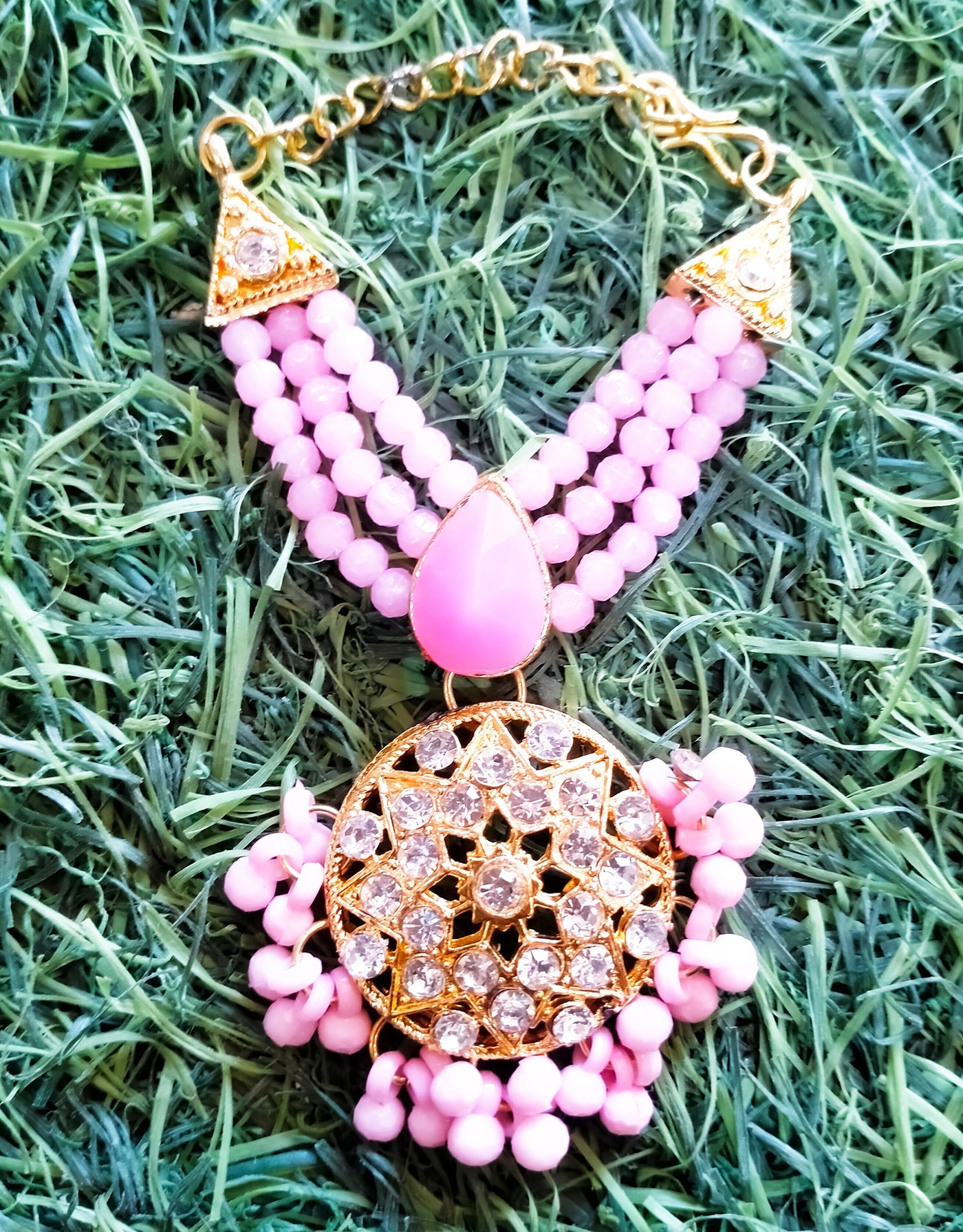 Drop bead with round stone pendent
