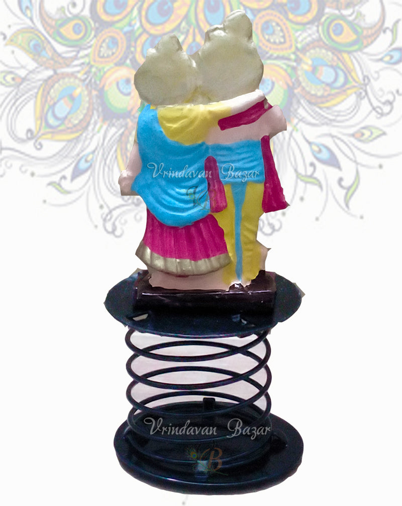 Radha Krishna in blue, pink and yellow fun spring