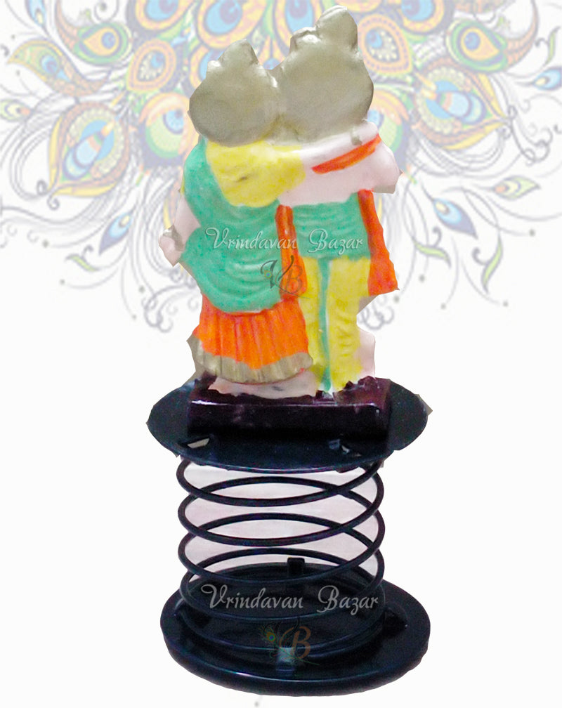 Radha Krishna in orange, green and yellow fun spring