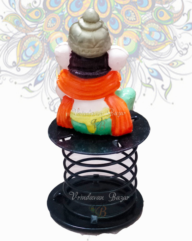 Orange and Green Ganpati with stick fun spring