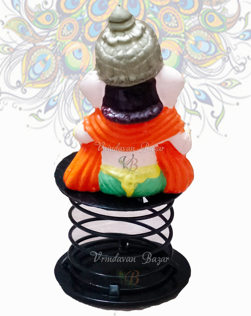 Orange and Green Ganpati with book fun spring