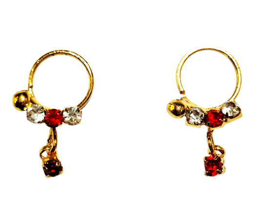 Golden earring with red/white stone