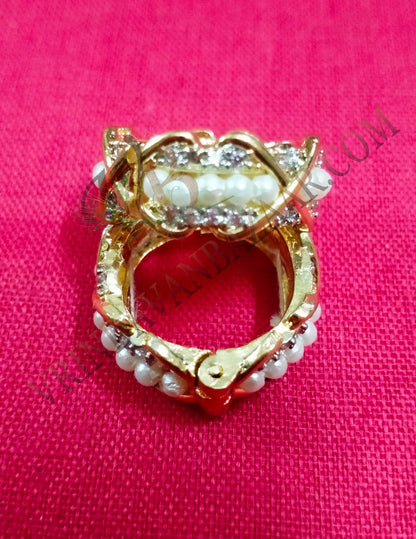 Pearl and artificial stone kangan/ bangle with cris cross