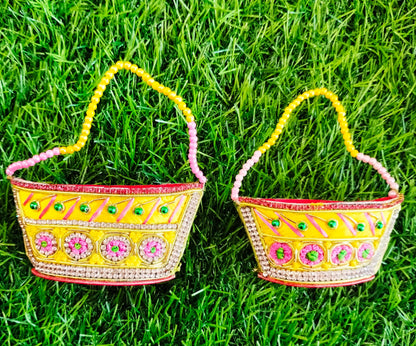 Special zardozi purse in Yellow with pink design