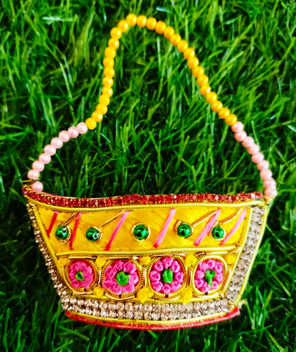 Special zardozi purse in Yellow with pink design