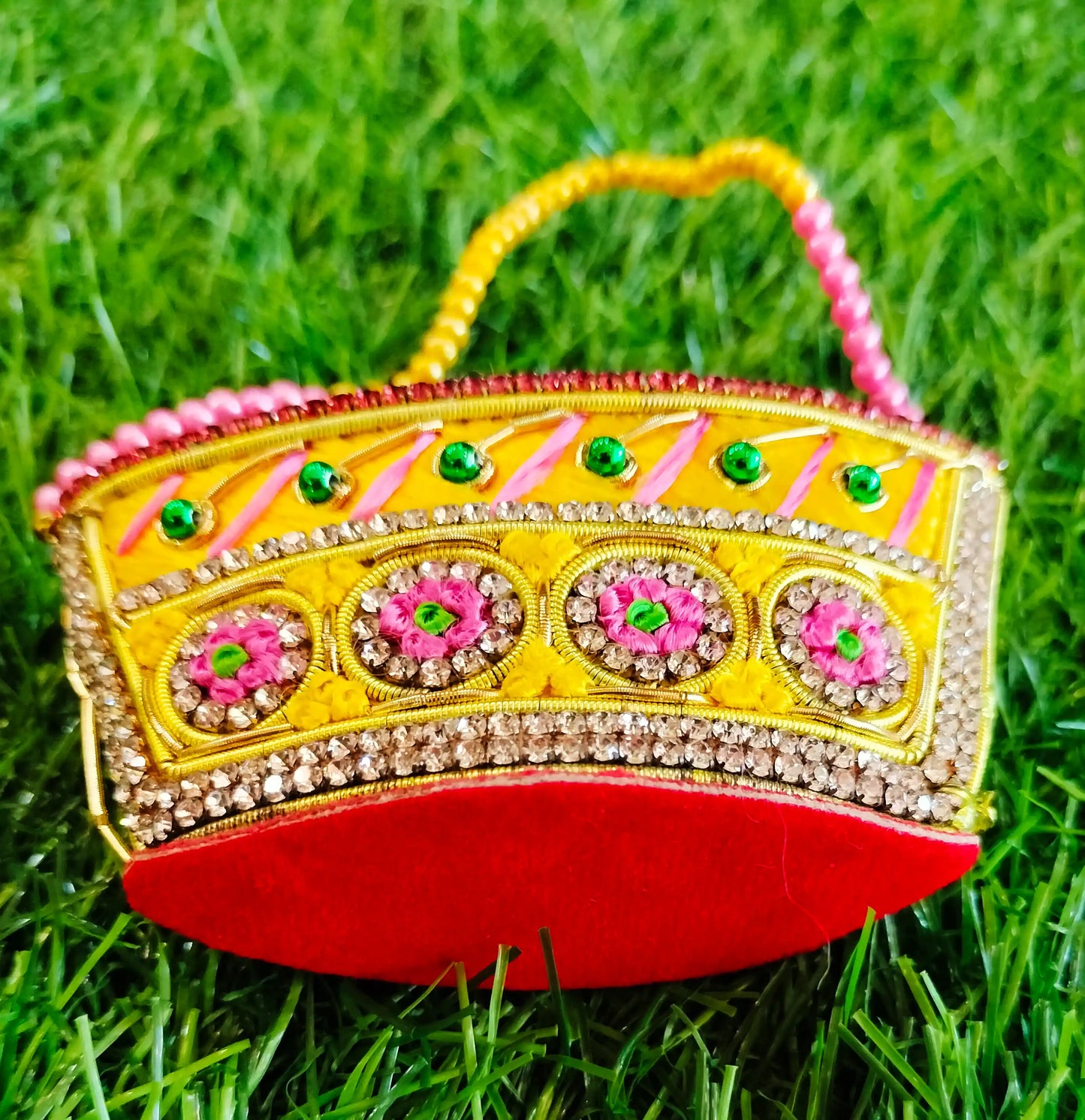 Special zardozi purse in Yellow with pink design