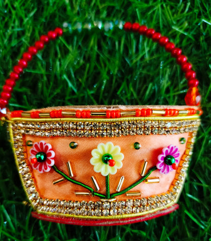 Peach zardozi purse with 3 flower design