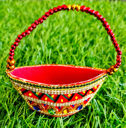 Red zardozi purse with zig zag pattern