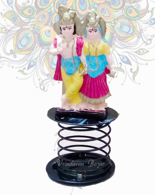 Radha Krishna in blue, pink and yellow fun spring