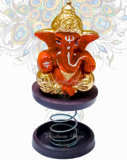 Orange Ganpati with gold painting fun spring