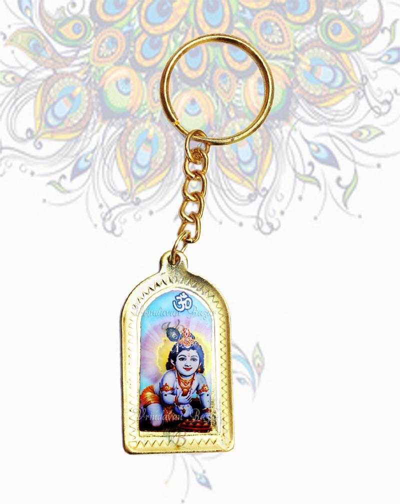 Baby Krishna key ring in golden metal