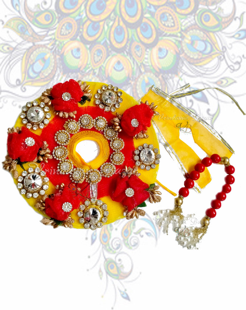 Red ribbon flower on yellow zari laddu gopal dress with kundan stones